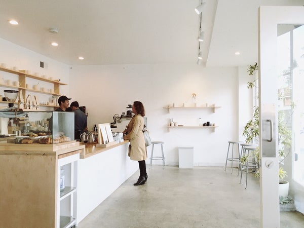The minimal wood-lined interior at Maru Coffee