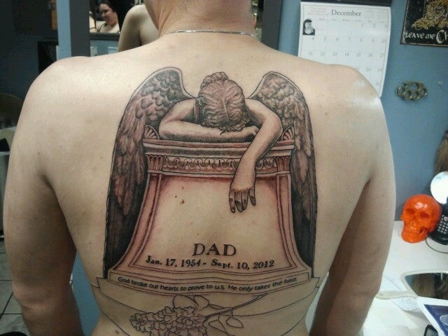 angel crying on tombstone tattoo