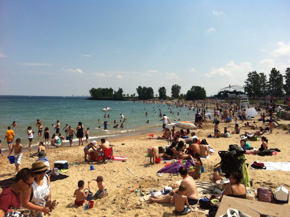 Chicago, Illinois, USA. The 12th Street Beach, a narrow strip of sand south  of the Adler Planetarium that provides some relief from the summer heat  Stock Photo - Alamy