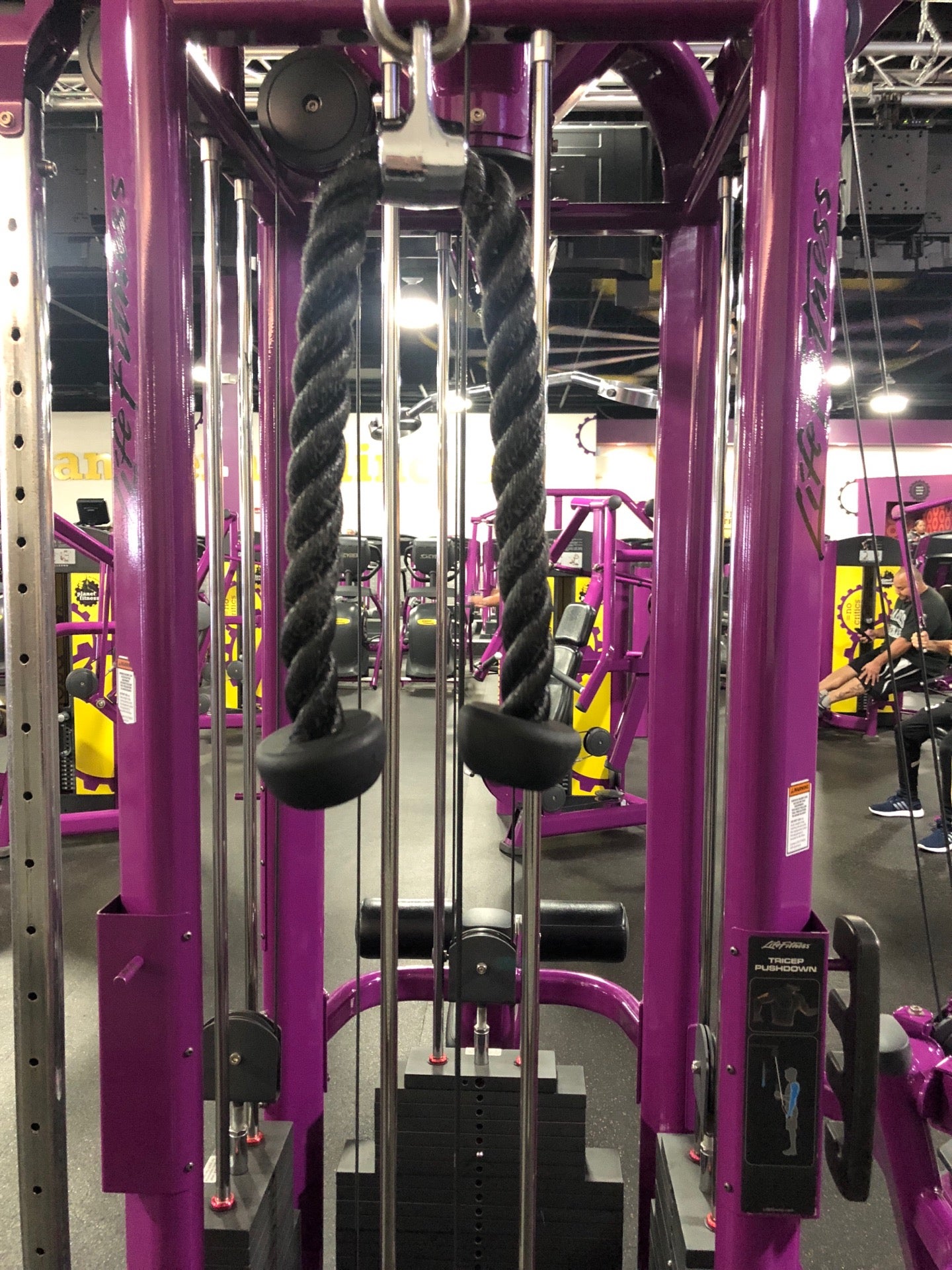 Tricep machine planet discount fitness