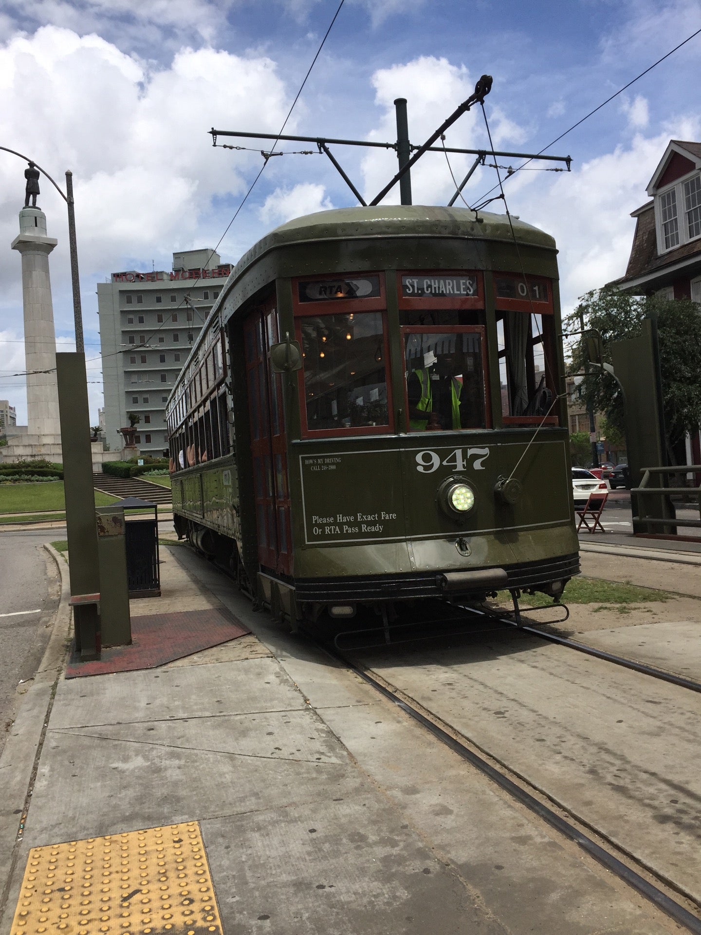 File:20080622 St. Charles St. Trolley behind tree with Mardi Gras