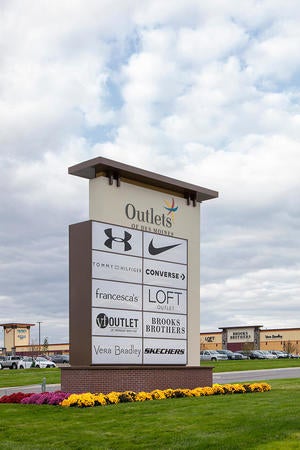 Stop by Michael Kors for - Outlets of Des Moines
